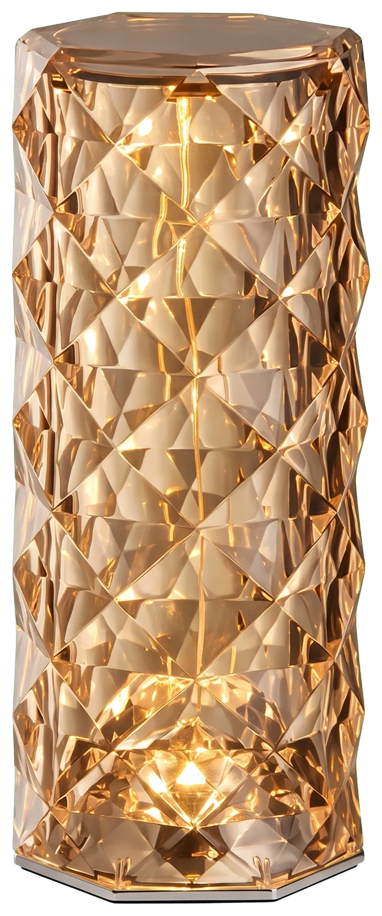 Rose-cut acrylic table lamp glowing warm on a dark surface, light breaking across the cut petals